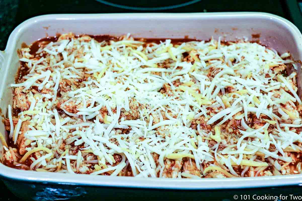 casserole covered with cheese ready for oven