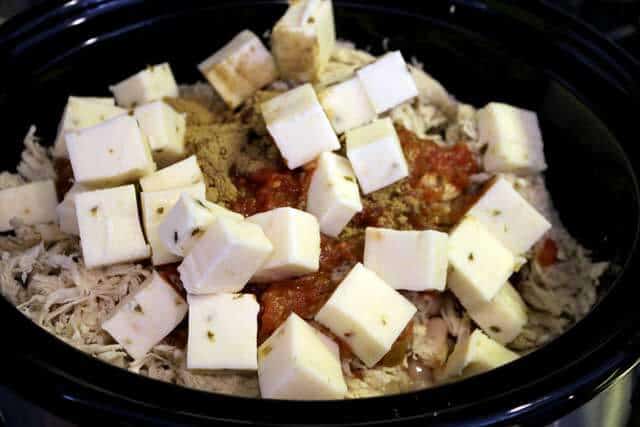 Image of all ingredients in a smaller black crock pot