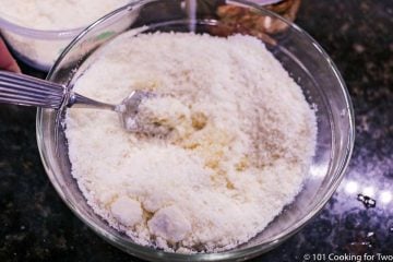 Mixing topping ingredients in small bowl