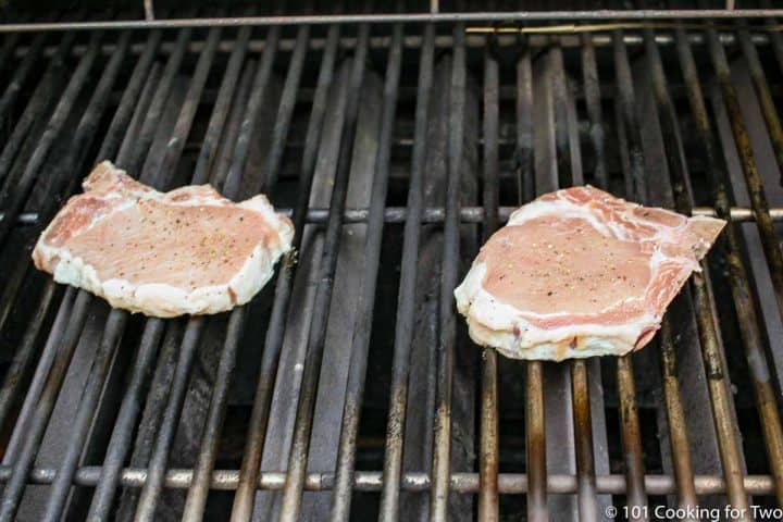 pork chops on grill grates