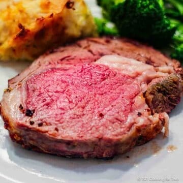 slice of Ribeye Roast on a white plate