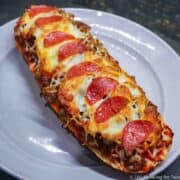 French Bread Pizza on a gray plate
