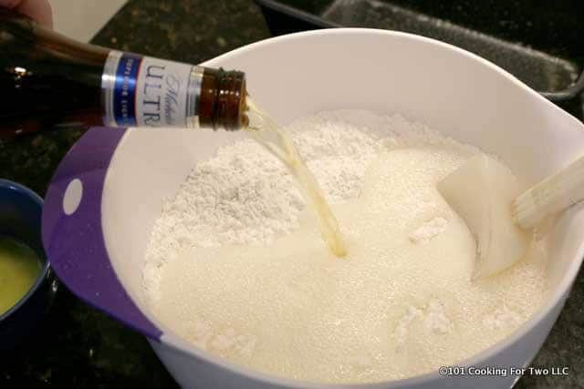 image of adding beer to flour mixture
