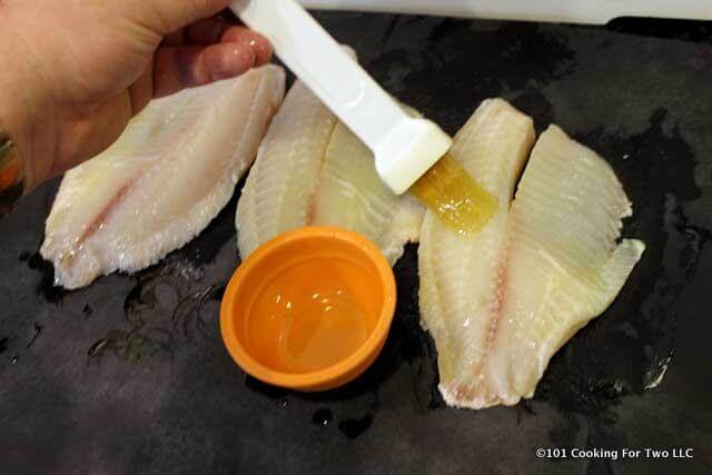 picture of brushing tilapia with oil