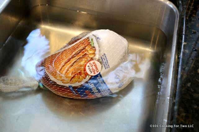picture of thawing a frozen breast in water