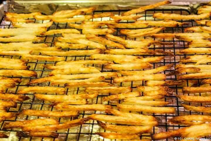 cooked fries on tray