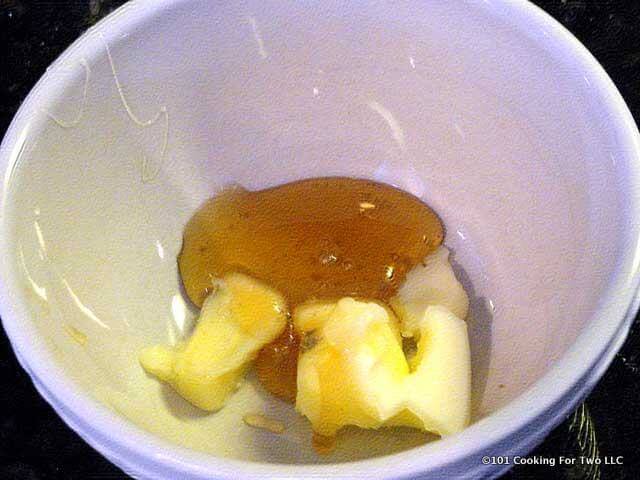 butter with honey in a small white bowl