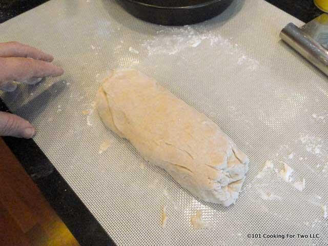 form dough into a log on a floured mat