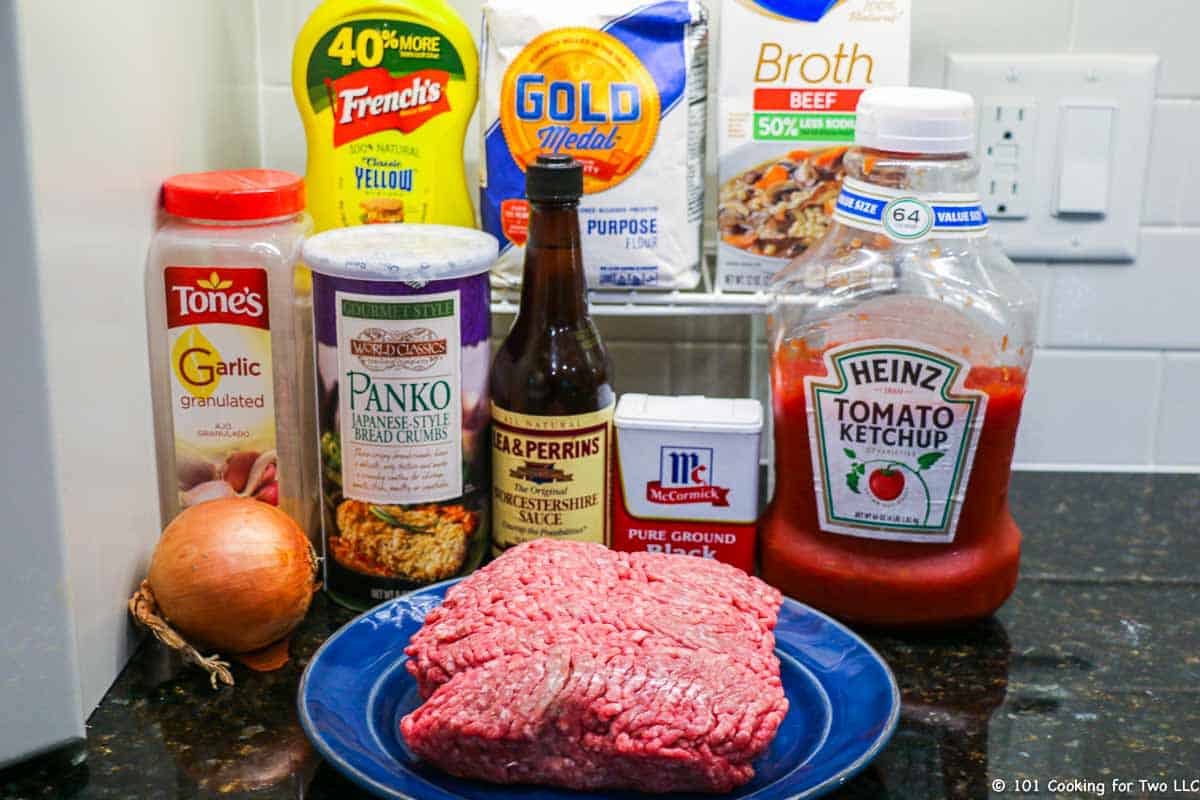 raw burger with ingredients