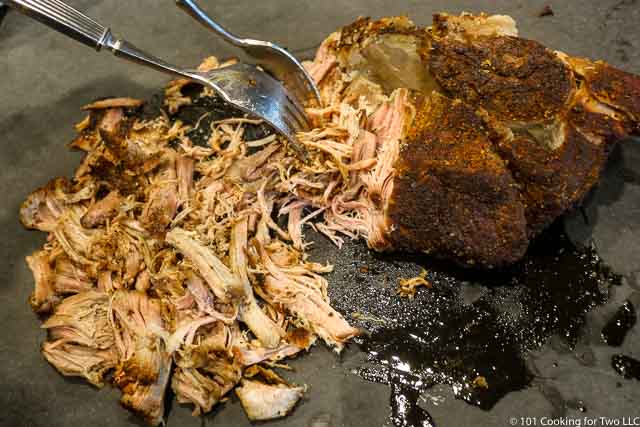 Image of shredding the pork with two forks