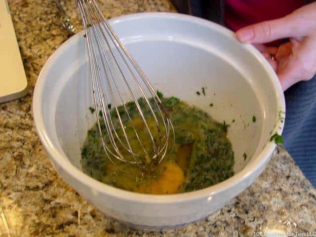 image of mixing eggs with the herbs