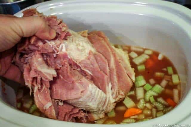adding meaty ham bone to white crock pot