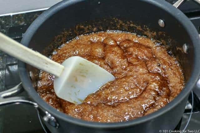 image of boiling carmel in a sauce pan