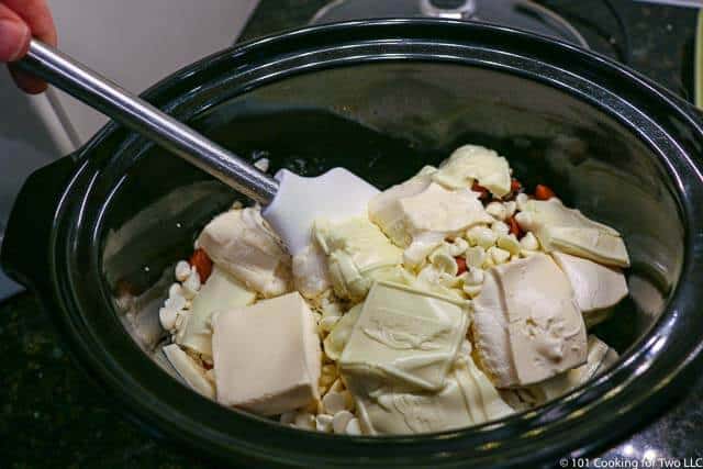 Image of mixing the melted ingredients together in the crock pot