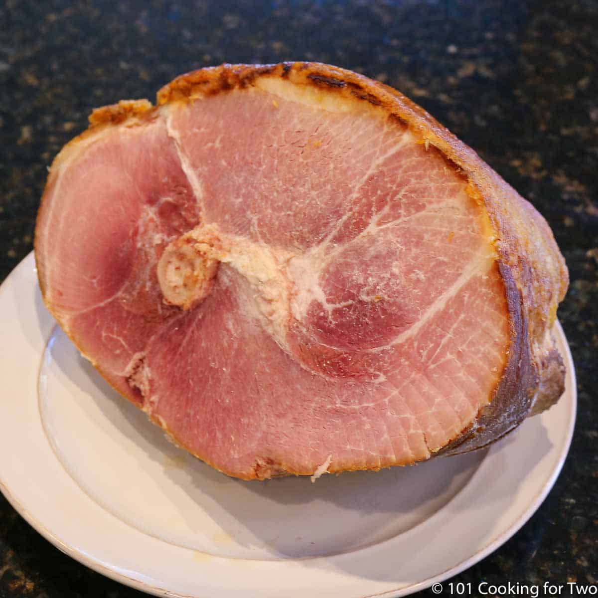 ham on a white plate.