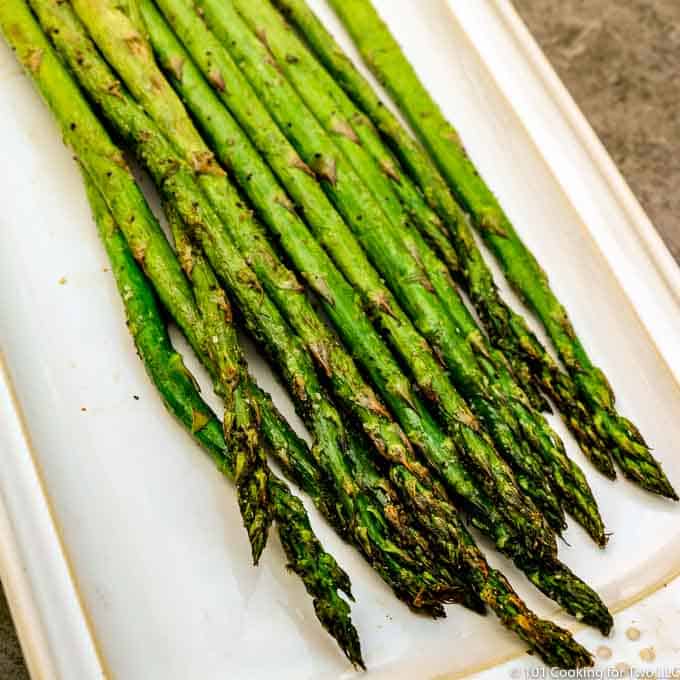 image of asparagus on a white platter