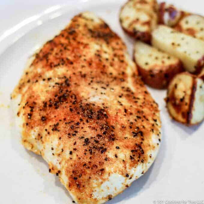 image of baked chicken on white plate