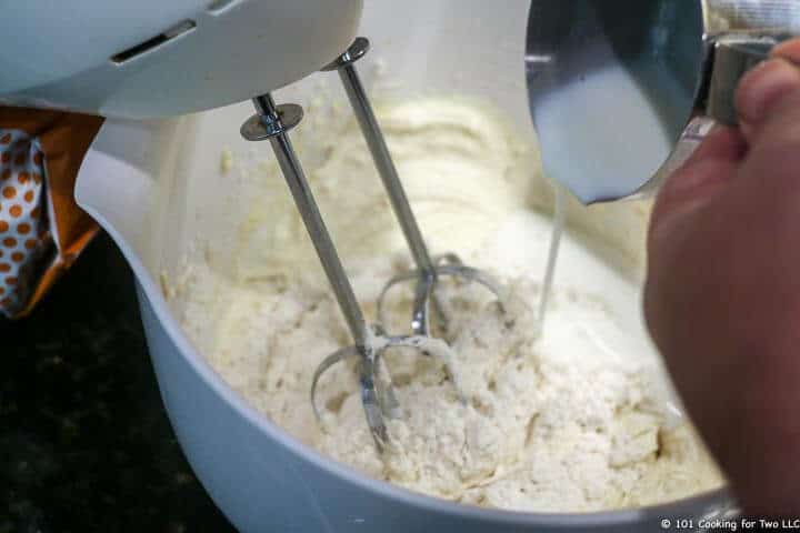 mix in flour and buttermilk with hand mixer