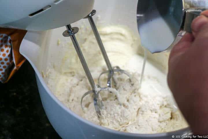 mix in flour and buttermilk with hand mixer.