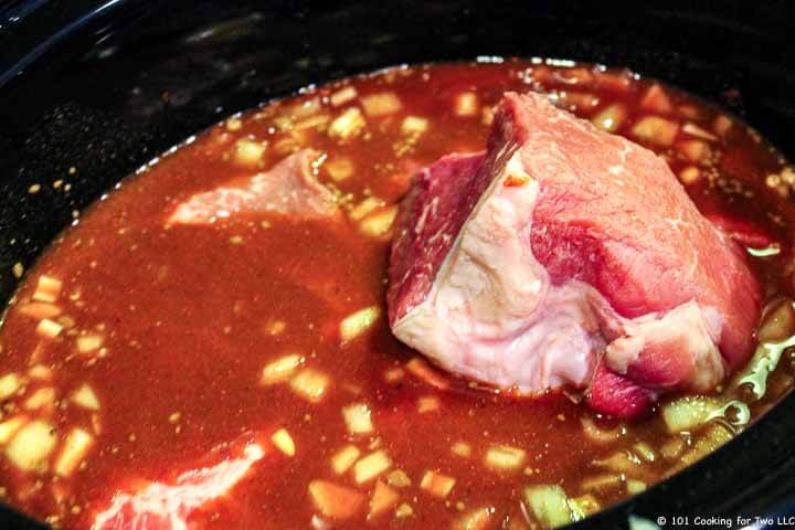 adding chuck roast to crock pot