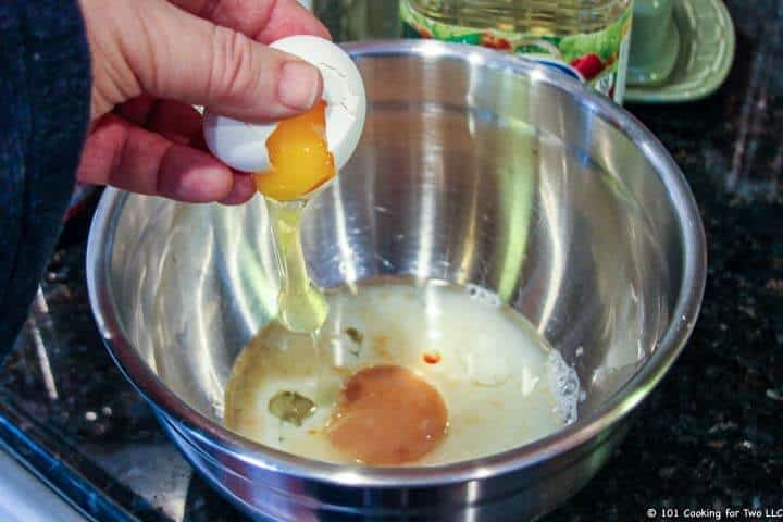 adding egg to other wet ingredients.