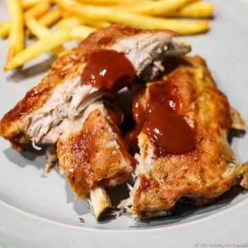 baked baby back ribs on gray plate