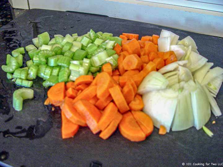 chopped veggies on black board