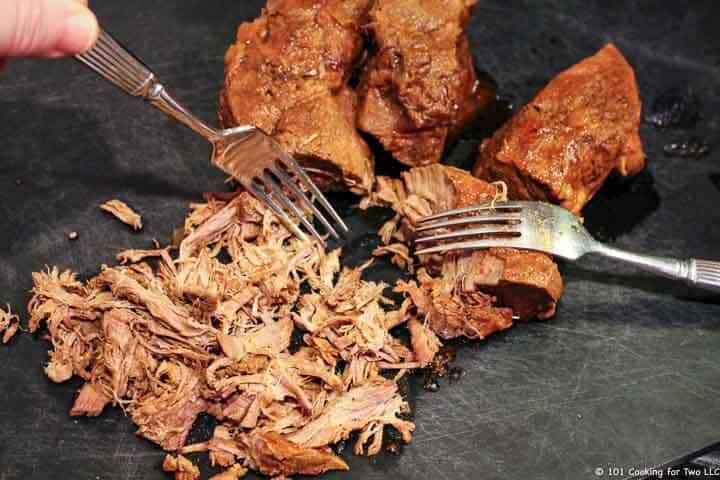 shredding beef on black board.