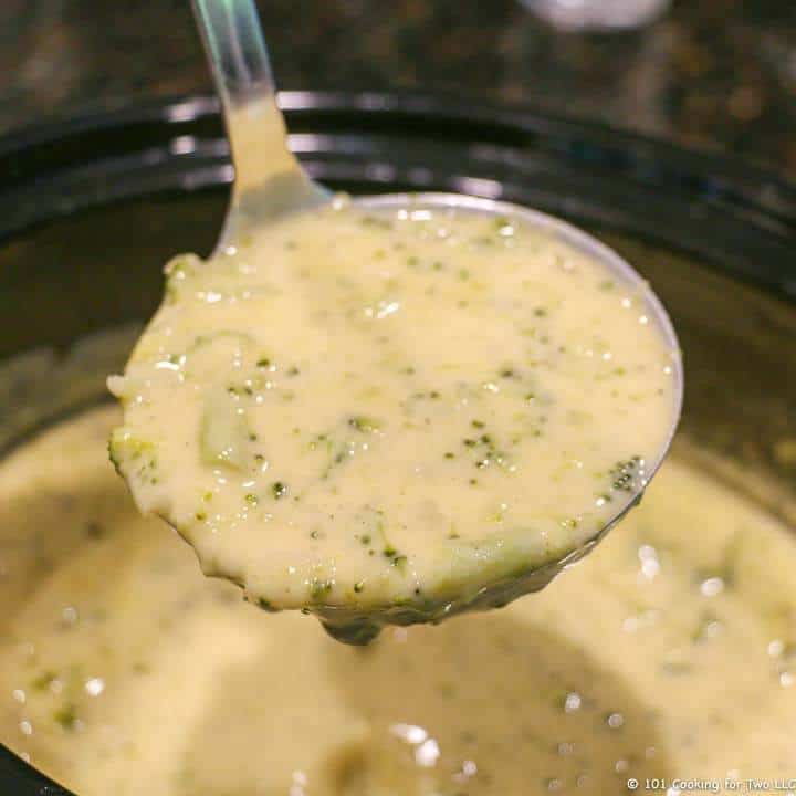 broccoli cheese soup in ladle.