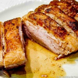 Pan Seared Oven Roasted boneless pork ribs on plate