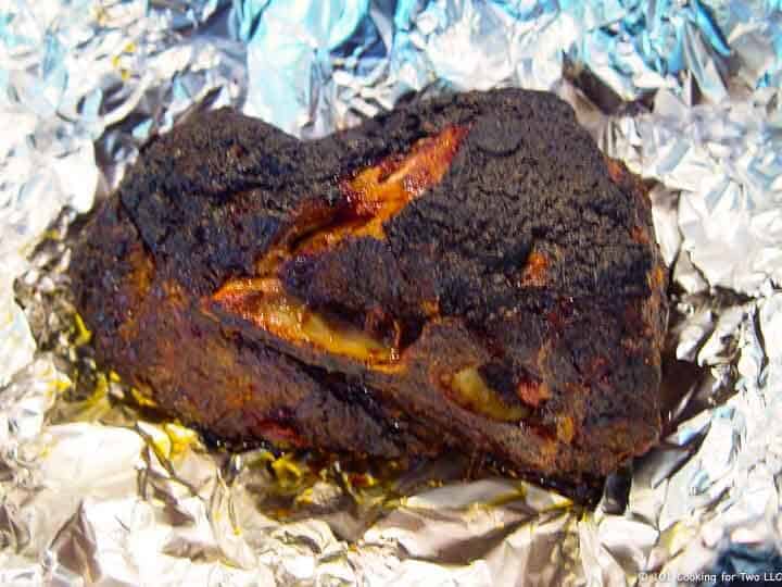 cooked pork butt on foil