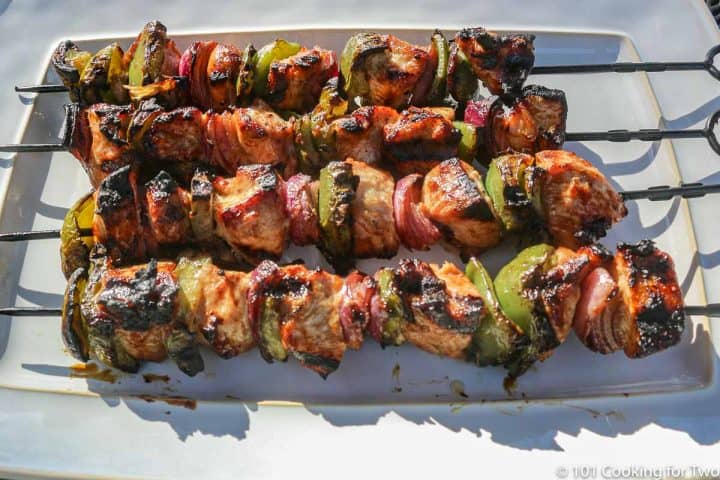 grilled kabobs on white tray