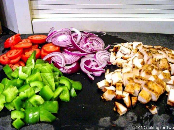 ingredients on black board for pizza