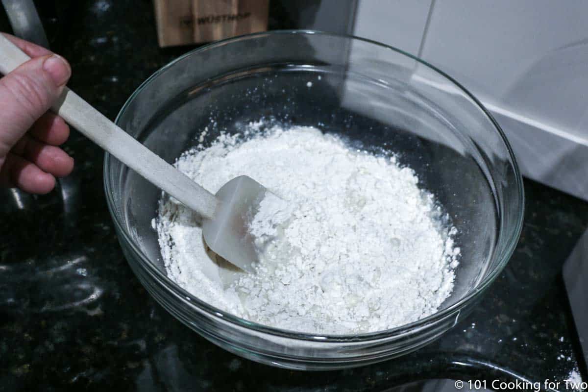 mixing dry ingredients in glass bowl
