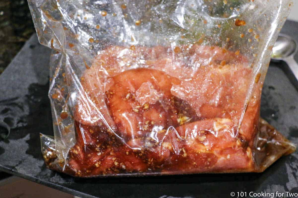 Pork Loin in pastic bag with marinade.