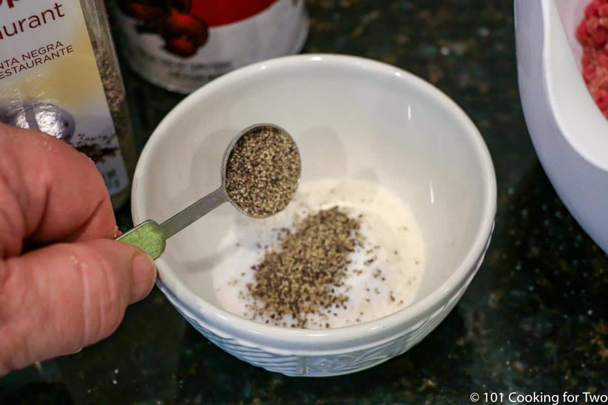 Mixing spices in a small bowl