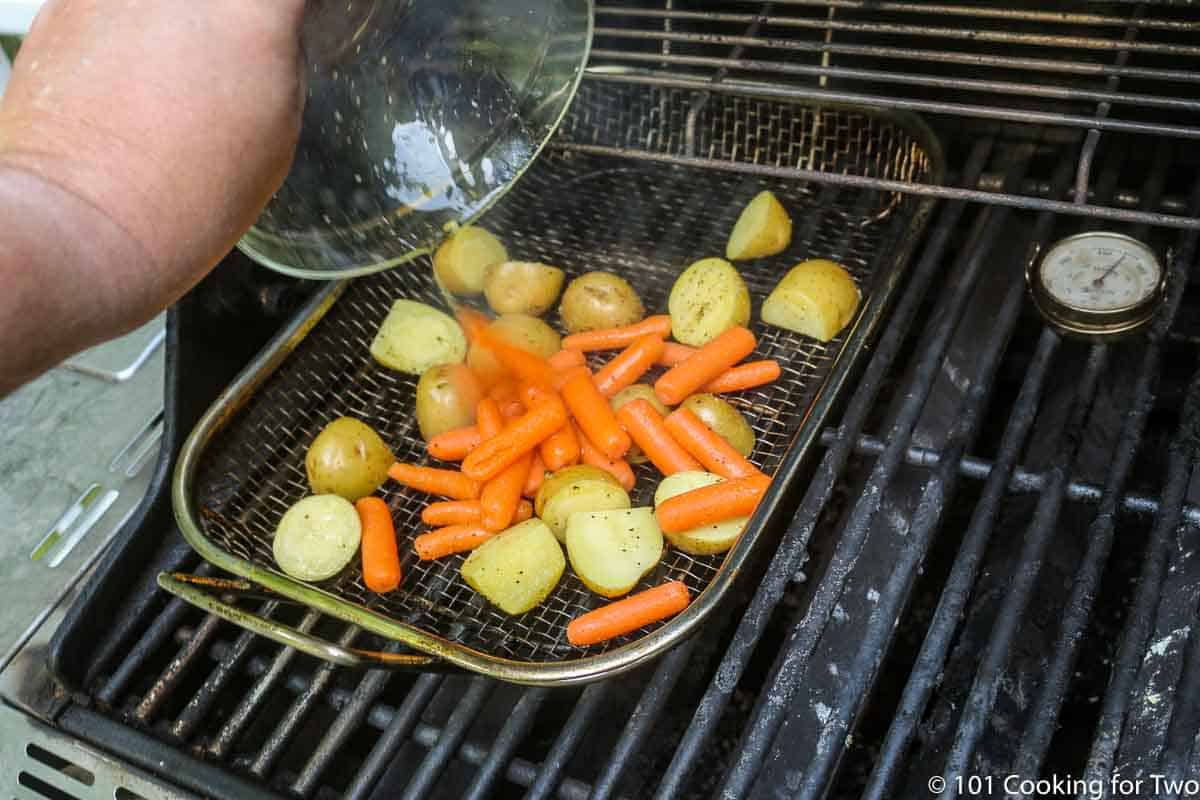 carrots and potatoes in grill pan.