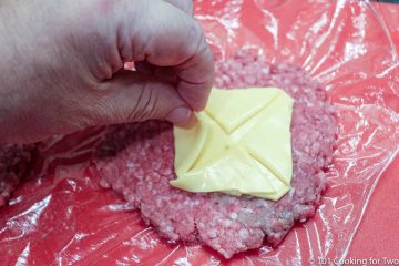cheese on raw burger for stuffing
