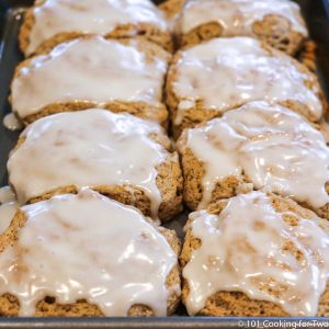 cinnamon biscuits with glaze on tray