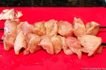 cubes of chicken on skewers
