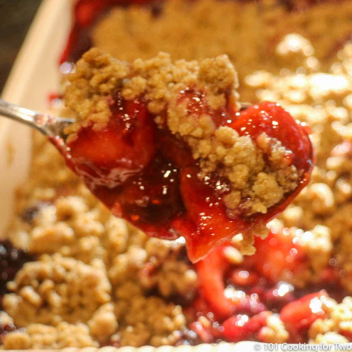 fruit crumble on a spoon