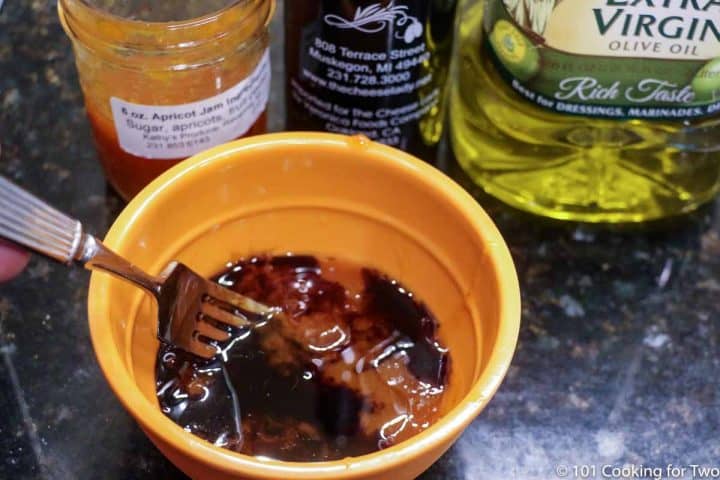 mixing apricot glaze in small bowl