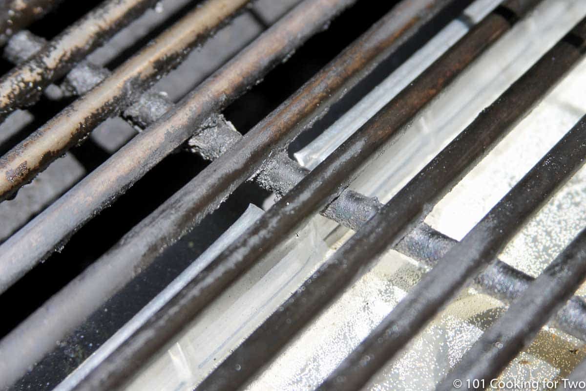 notch in pan under grill grate.