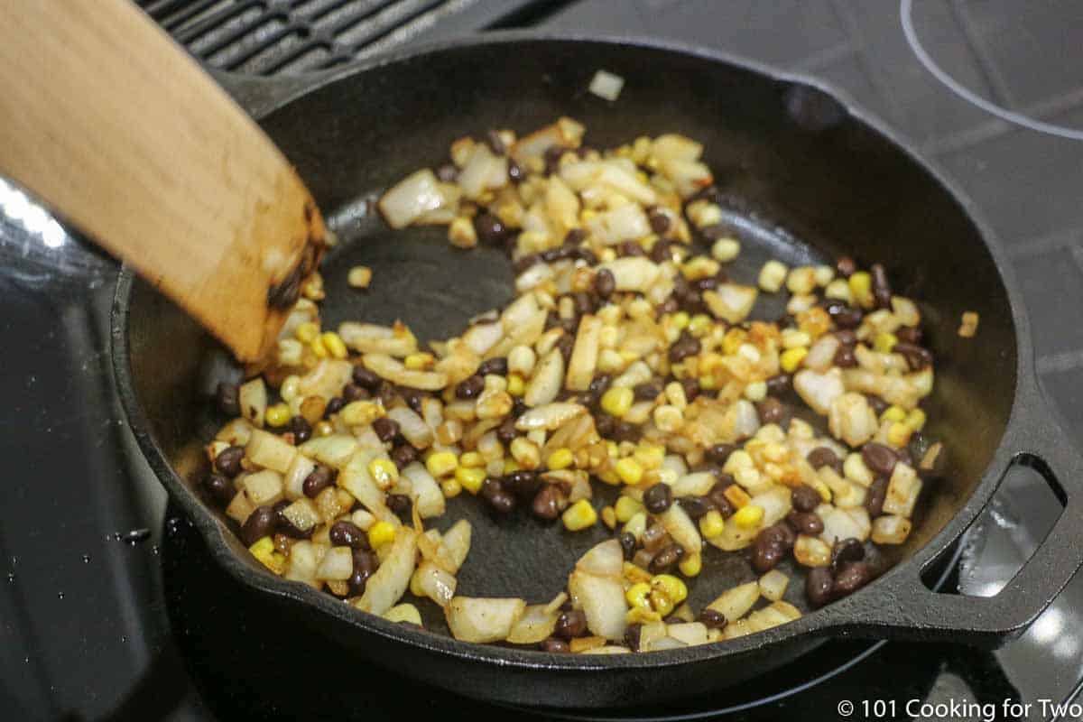 warming toppings in a skillet