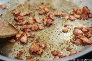frying bacon in a large frying pan