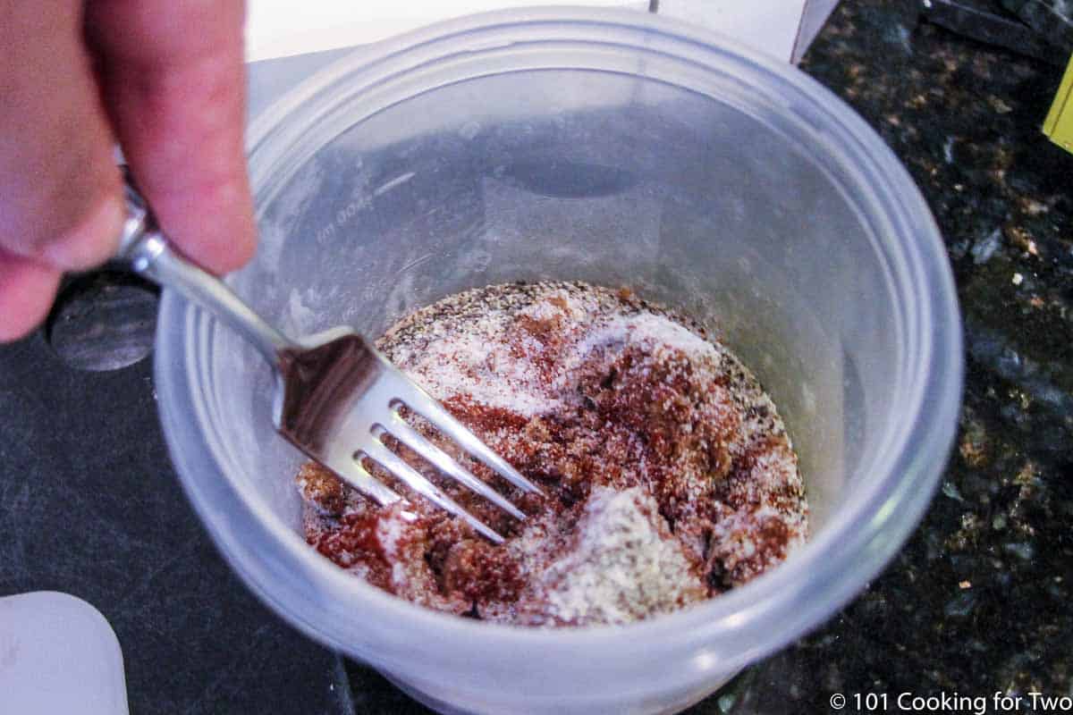 mixing spices in small bowl