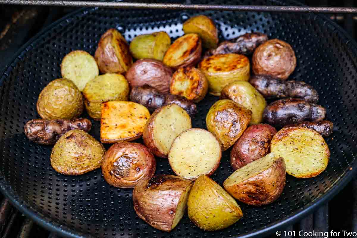 potatoes browning nicely in a grill pan