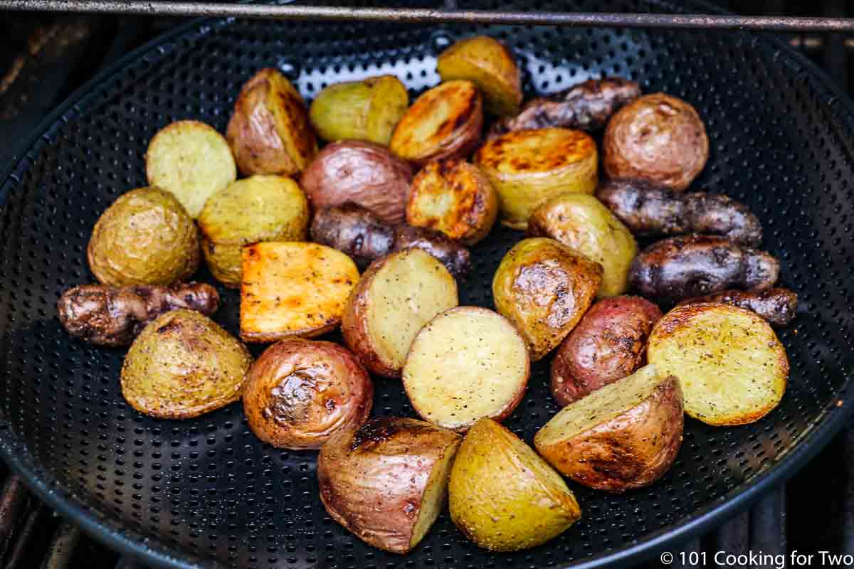 potatoes browning nicely in a grill pan.