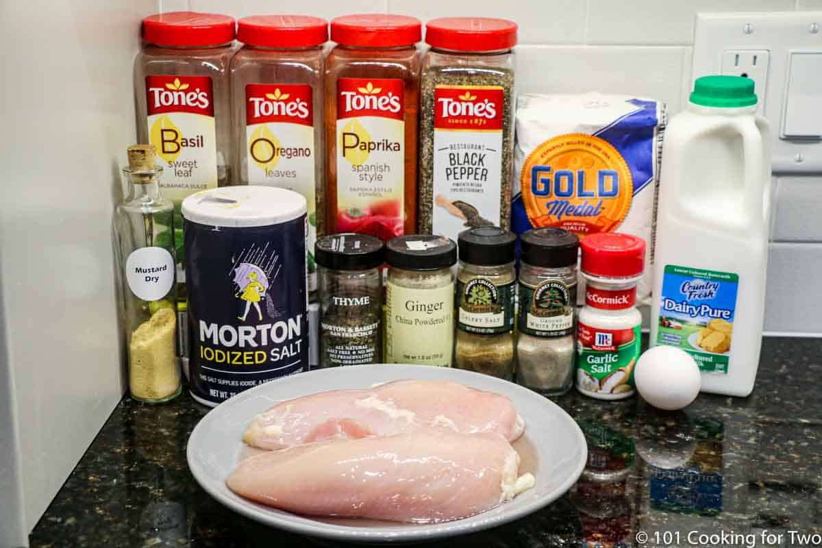 raw chicken breast and seasonings