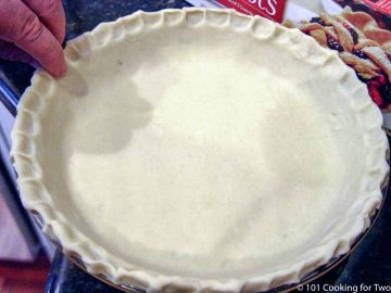 raw pie crust ready for the oven